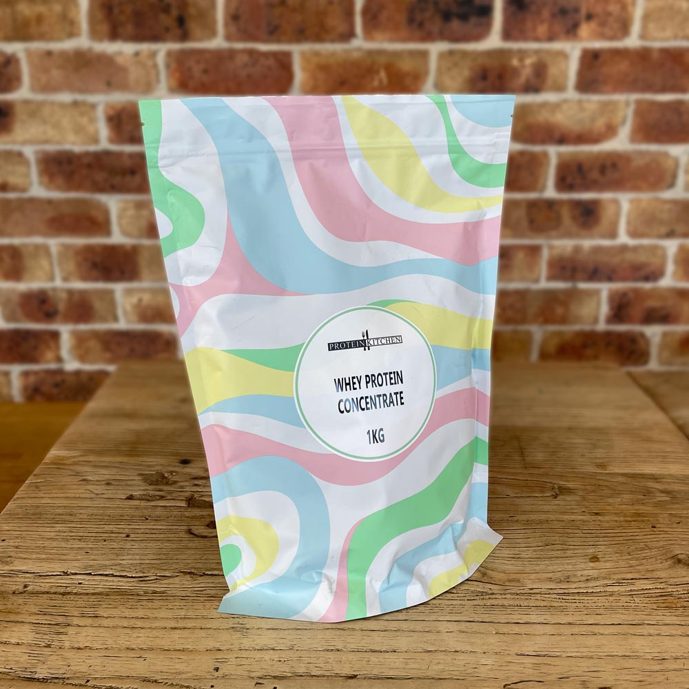 Protein Kitchen Whey Protein Concentrate 1kg Bag On A Table
